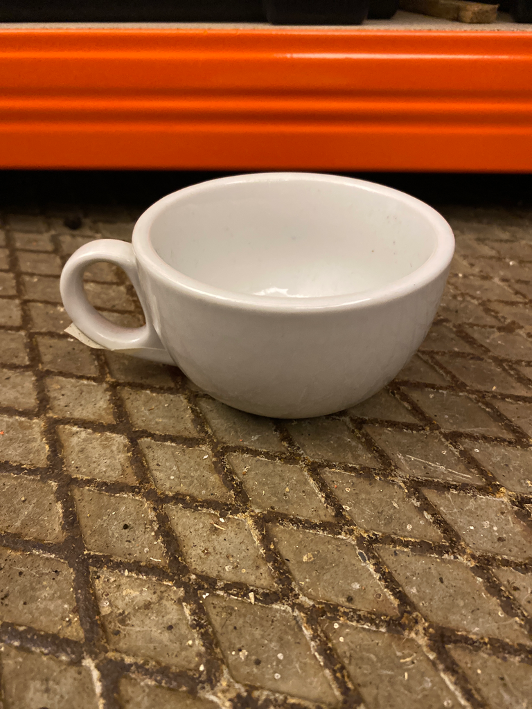 Wide-rimmed white coffee cup