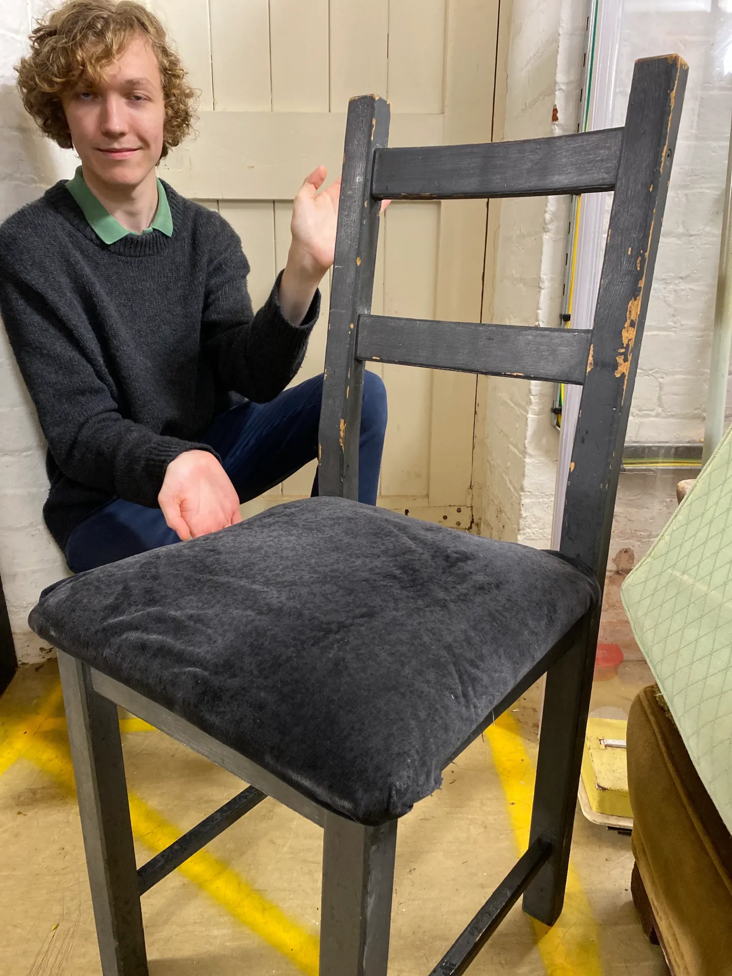 Black chair with fabric seat