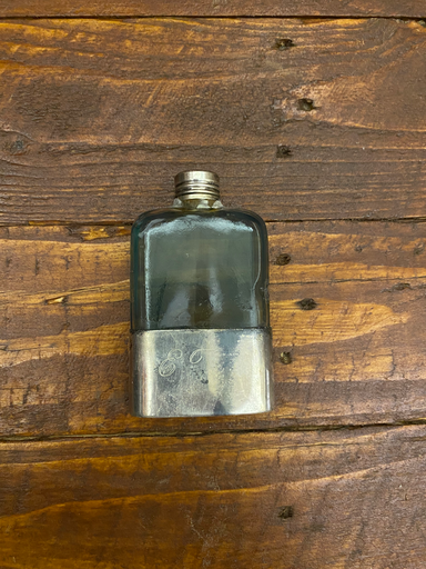 Small glass hip flask