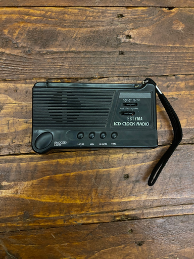 Handheld black radio clock